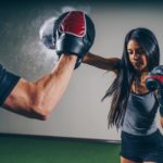 woman boxing gloves, woman boxing shorts with punching bags