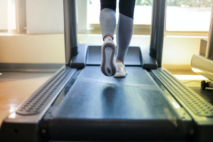 Can You Put a Treadmill on Carpet - Girl on treadmill